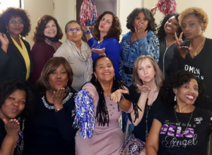 Pamela M. Covington with a diverse group of women
