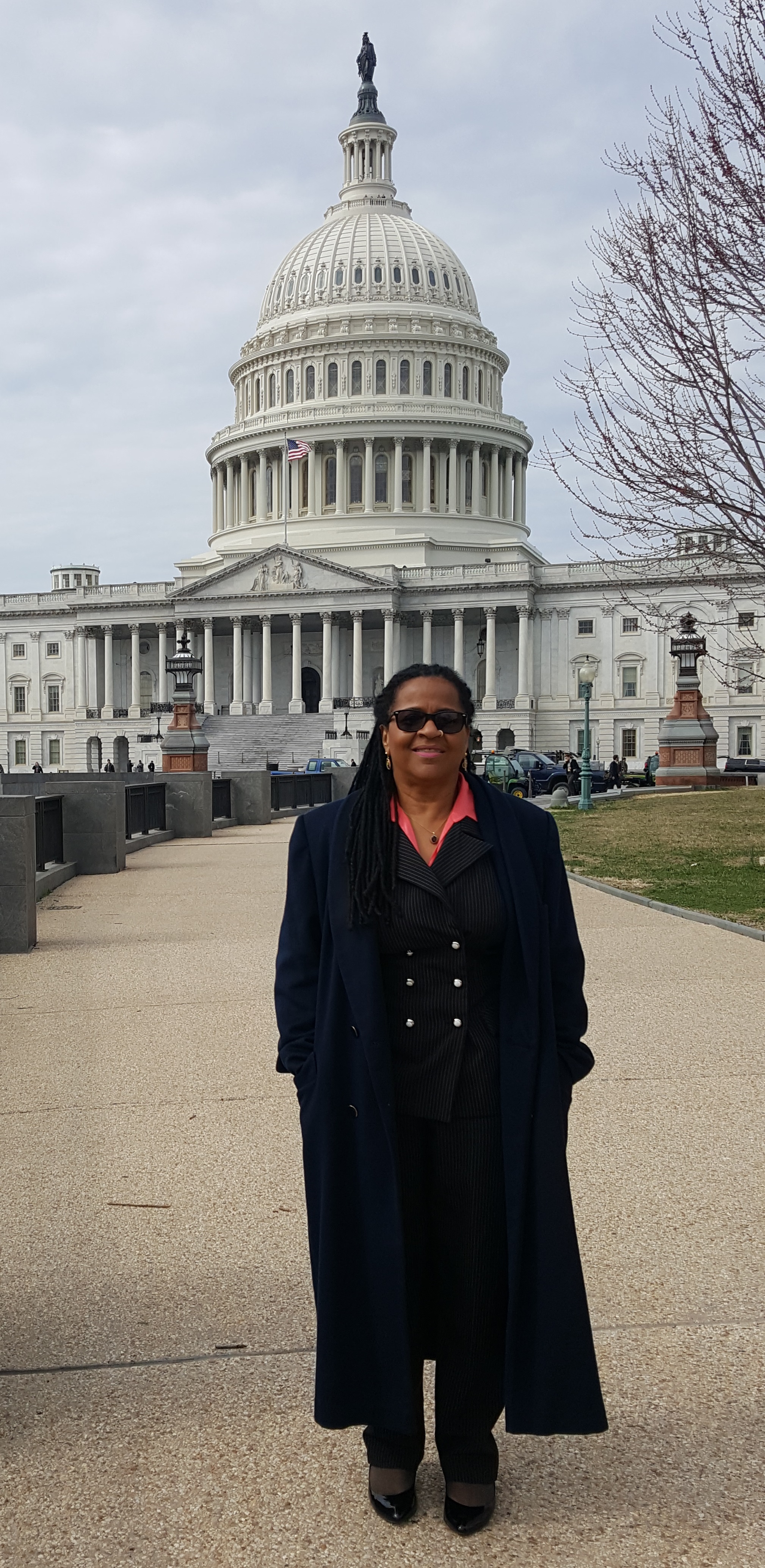 Pamela M. Covington dressed in a full-length coat in preparation for a blustery day on Capital Hill.